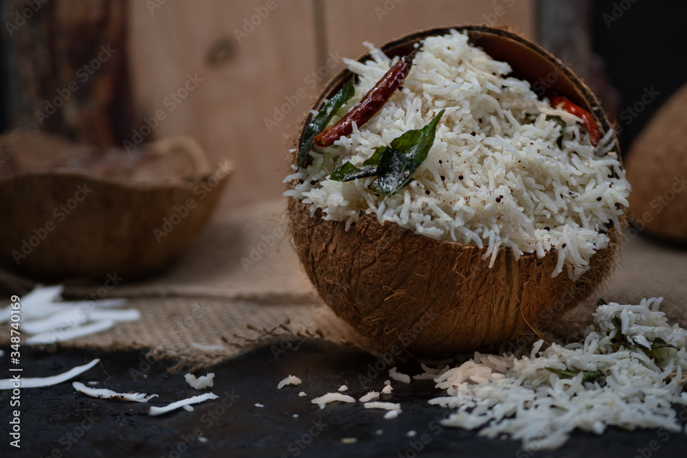 Coconut rice pilaf served in coconut shell