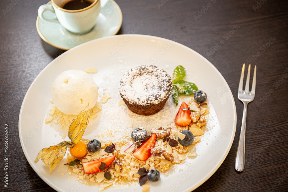 Chocolate fondant with vanilla ice cream, almond Chocolate fondant with vanilla ice cream, almond