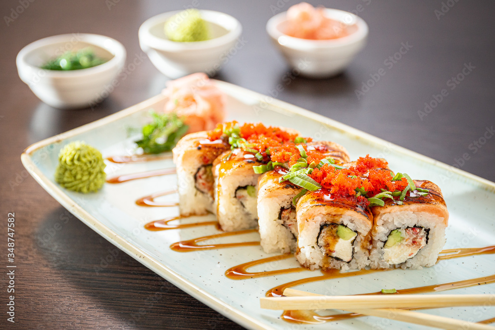 Sushi maki with salmon, shrimp, cucumber