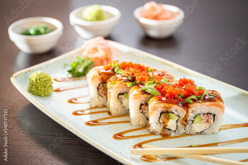 Sushi maki with salmon, shrimp, cucumber