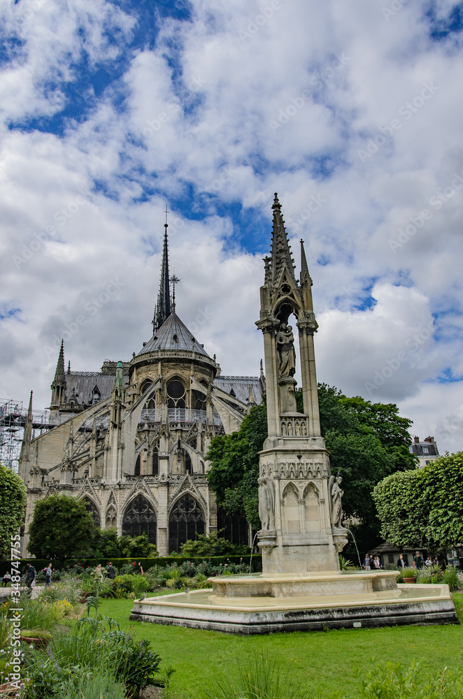 Notre Dame Cathedral and the Fontaine de la Vierge, Paris, France.