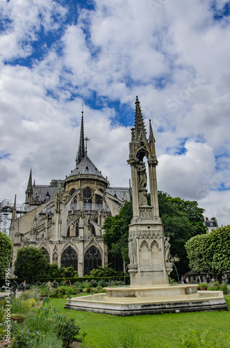 Notre Dame Cathedral and the Fontaine de la Vierge, Paris, France.