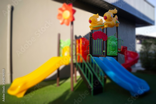 Wallpaper Mural Colorful children playground on yard Torontodigital.ca