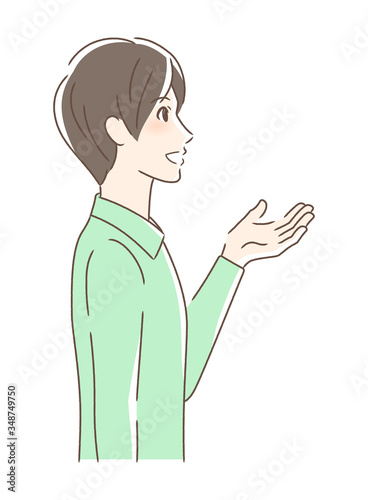 笑顔で手を差し出す男性の横顔