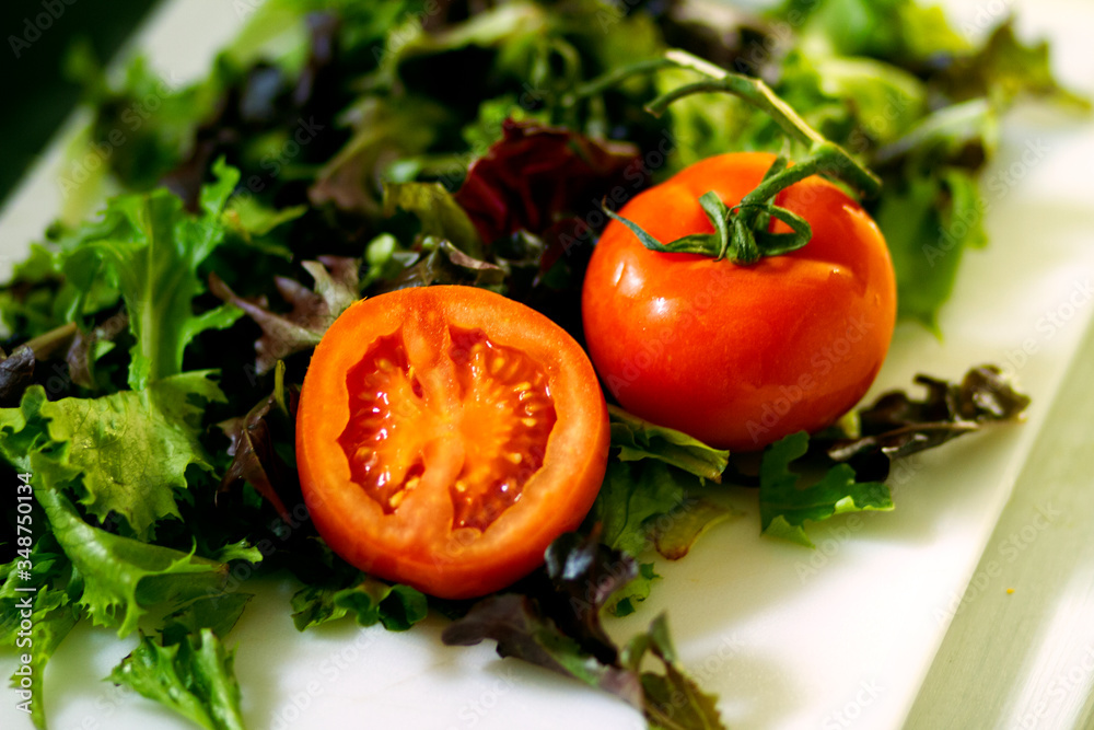 Tomatoes on Bed of Mixed Greens Healthy Eating Tomatoes on Bed of Mixed Greens Healthy Eating