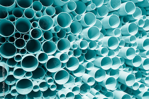 Blue plastic pipes used in construction site,PVC pipes stacked.