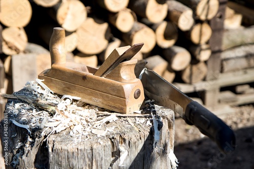 wood planer and big knife on wooden block