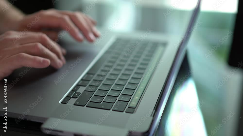 Laptop trackpad with male hands internet Laptop trackpad with male hands internet