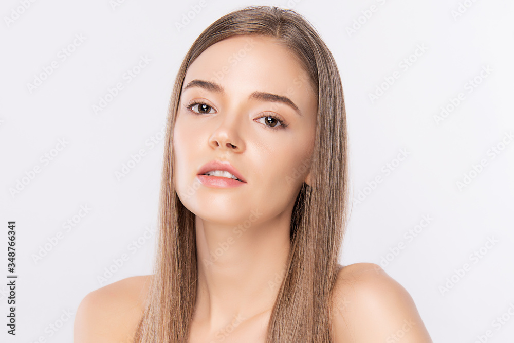 Fototapeta premium Beauty Woman face Portrait, Beautiful Young Woman with Clean Fresh Healthy Skin, Facial treatment. Cosmetology, beauty and spa, isolated on white background.