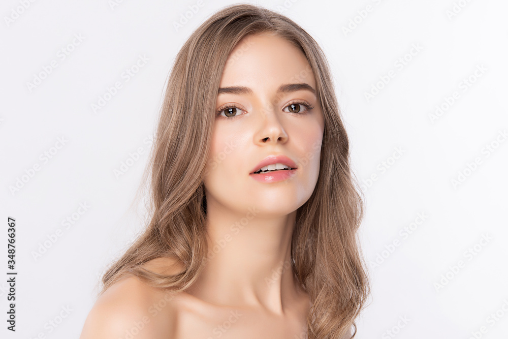 Fototapeta premium Beauty Woman face Portrait, Beautiful Young Woman with Clean Fresh Healthy Skin, Facial treatment. Cosmetology, beauty and spa, isolated on white background.