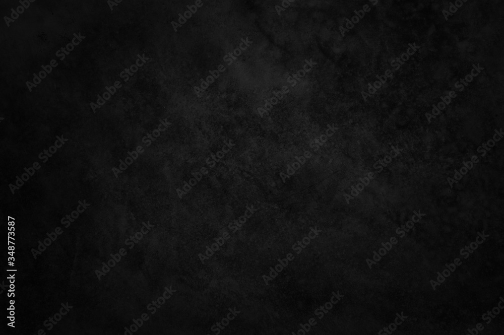 Dark concrete textured wall background.black grunge cement wall texture for interior design. dark edges.copy space for add text.	