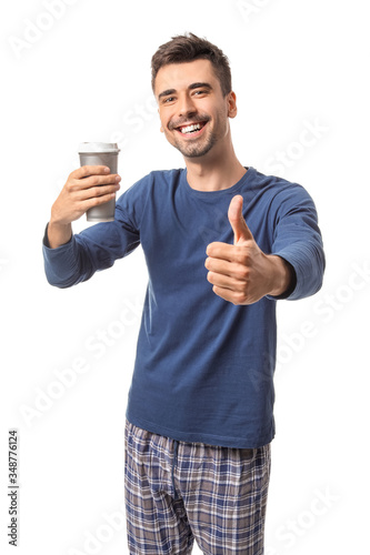 Young man with cup of hot c...
