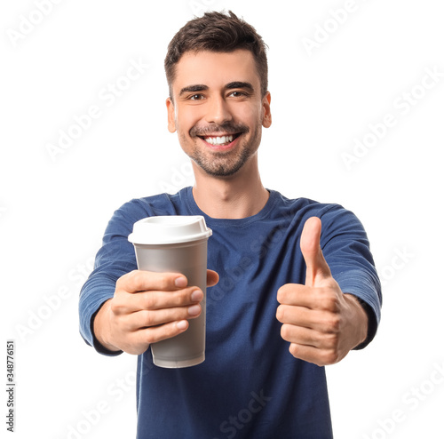 Young man with cup of hot c...