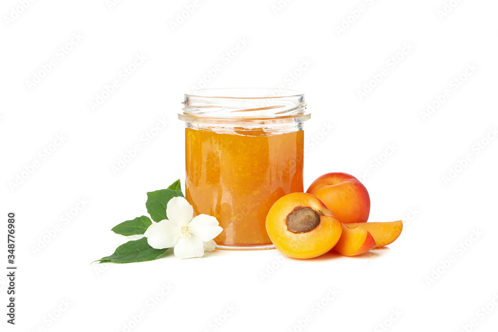 Glass jar with jam and apricots isolated on white background Glass jar with jam and apricots isolated on white background