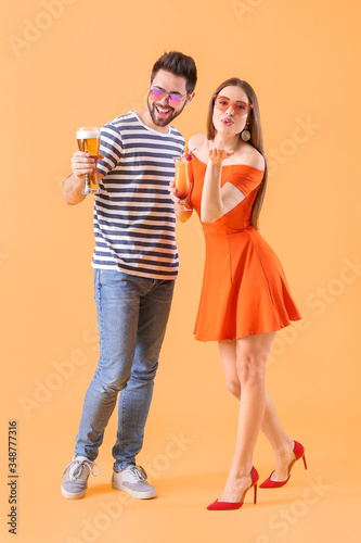 Happy young couple with alc...