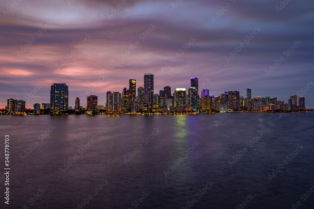 Downtown Miami skyline at sunset, Florida. Miami Florida, skyline of downtown night colorful skyscraper buildings.