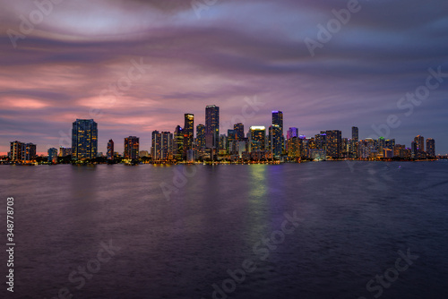Downtown Miami skyline at sunset, Florida. Miami Florida, skyline of downtown night colorful skyscraper buildings. © Volodymyr