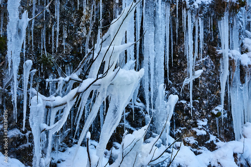 Wallpaper Mural Frozen waterfall in winter. Icicles on the rock. Torontodigital.ca