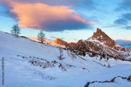 Gorgeous sunny view of Dolomite Alps first snow. Colorful winter scene of Monte Pelmo mountain range. Cortina location, Italy, Europe. Beauty of nature concept background. 