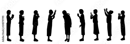 Silhouette of Jewish women praying.
Religious ultra-Orthodox mothers. Some hold arrangement, cry, beg, raise hands to heaven, say confession.
Black on a white background. Each character is separate. photo