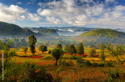 Fototapeta Naklejka Na Ścianę i Meble -  Valley Landscape of Myanmar with hill view and colorful fields
