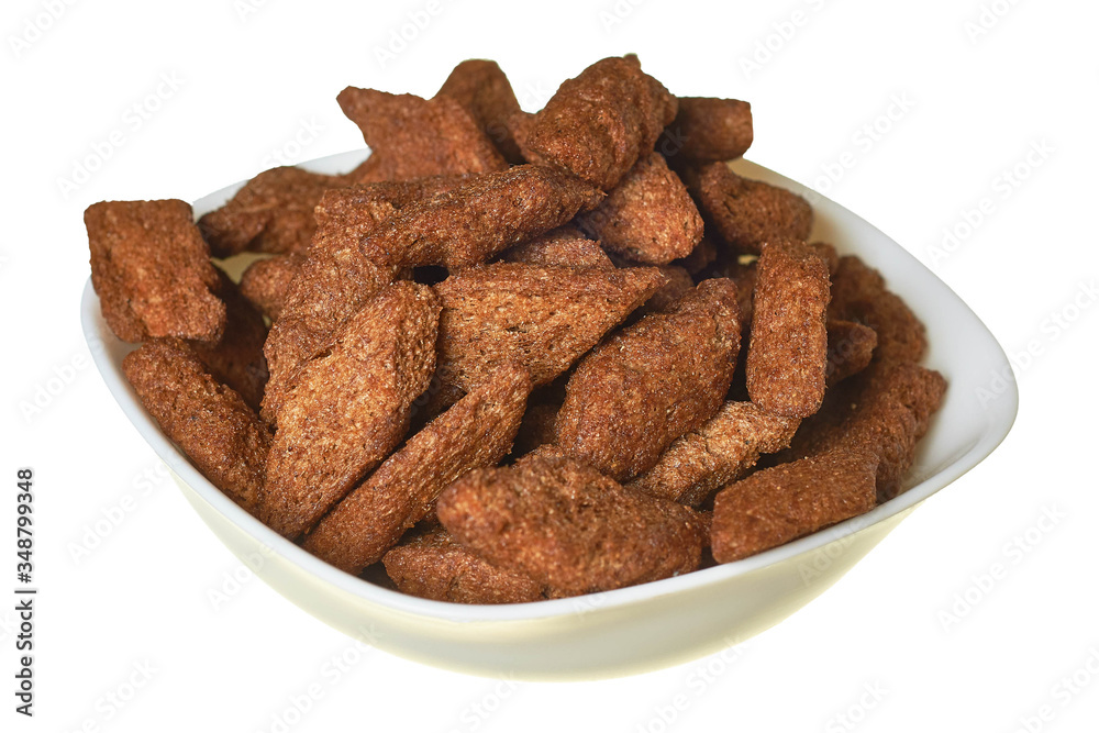 Full bowl of spicy hard chuck from brown bread isolated on white background Full bowl of spicy hard chuck from brown bread isolated on white background