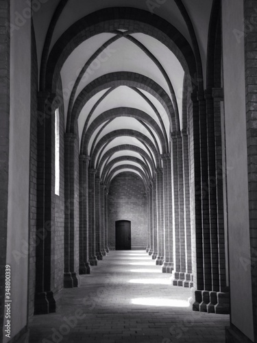 Empty Arched Corridor With Columns In Row