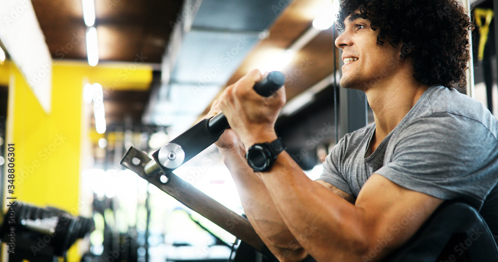 Portrait of healthy fit man working out in gym Portrait of healthy fit man working out in gym