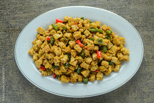 Oseng tempe or stir fry tempeh. Indonesian traditional food made from tempeh, chili, garlic and other ingredients. have good nutrition for the body.