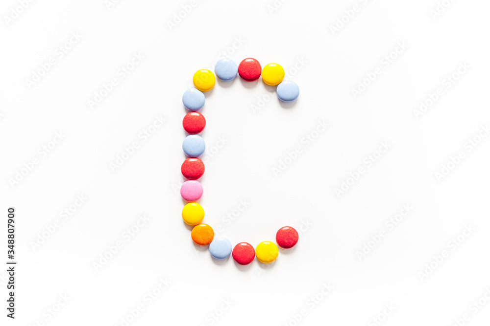 Candies font alphabet. Letter C isolated top view Candies font alphabet. Letter C isolated top view