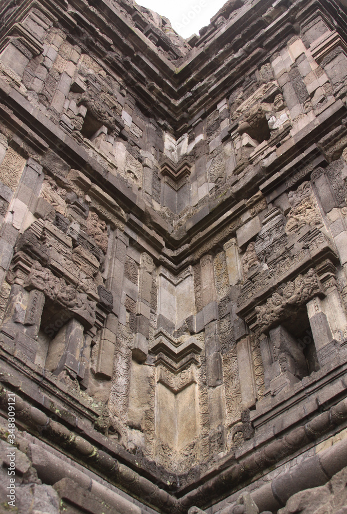 Mirror-like corner details of tower at Prambanan