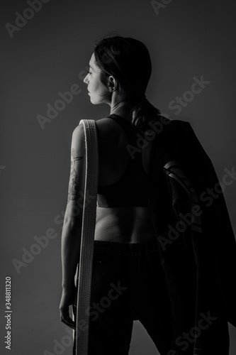 Brazilian jiu jitsu woman athlete in kimono