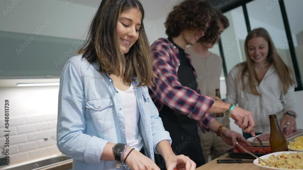 Flatmates cooking together at home