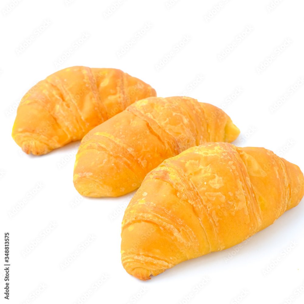 Closeup France croissant bread isolated on white background, top view of healthy bakery with copy space