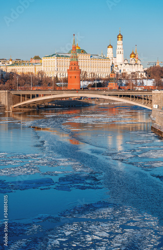 Classic view of the Moscow Kremlin. View from the Patriarchal bridge. Moscow river in ice.