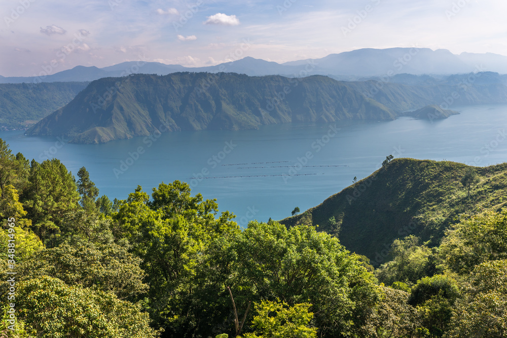 Aquaculture installations on Lake Toba, the largest volcanic lake in the world situated in the middle of the northern part of the island of Sumatra in Indonesia