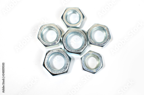 Set Of Metal Hexagon Nuts Isolated On White Background.