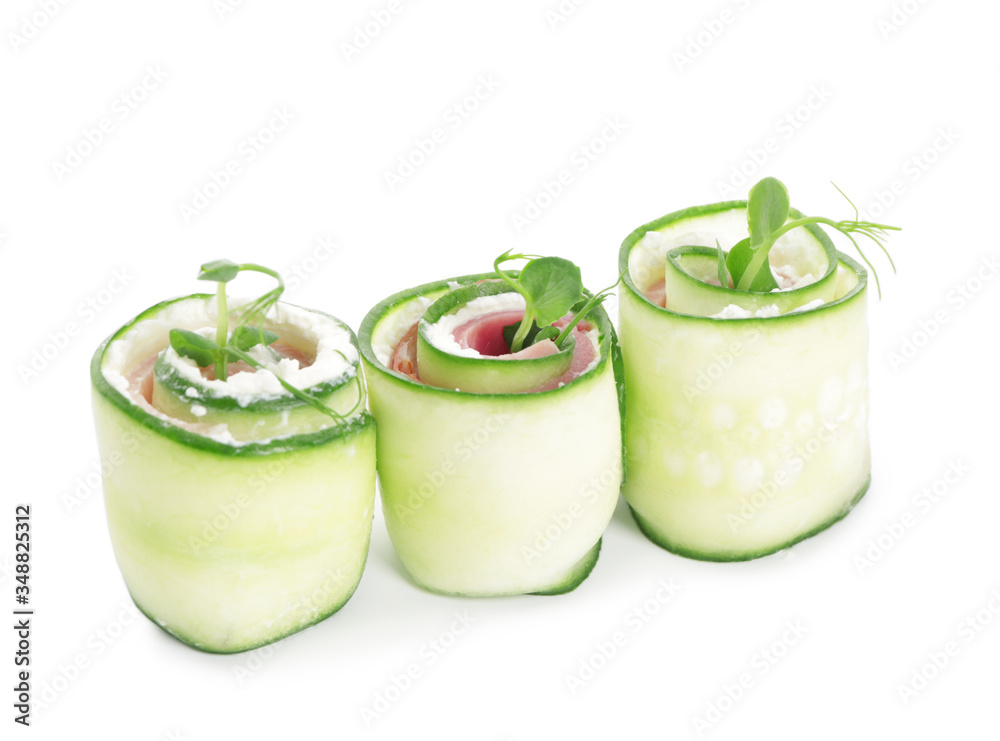Tasty cucumber rolls on white background