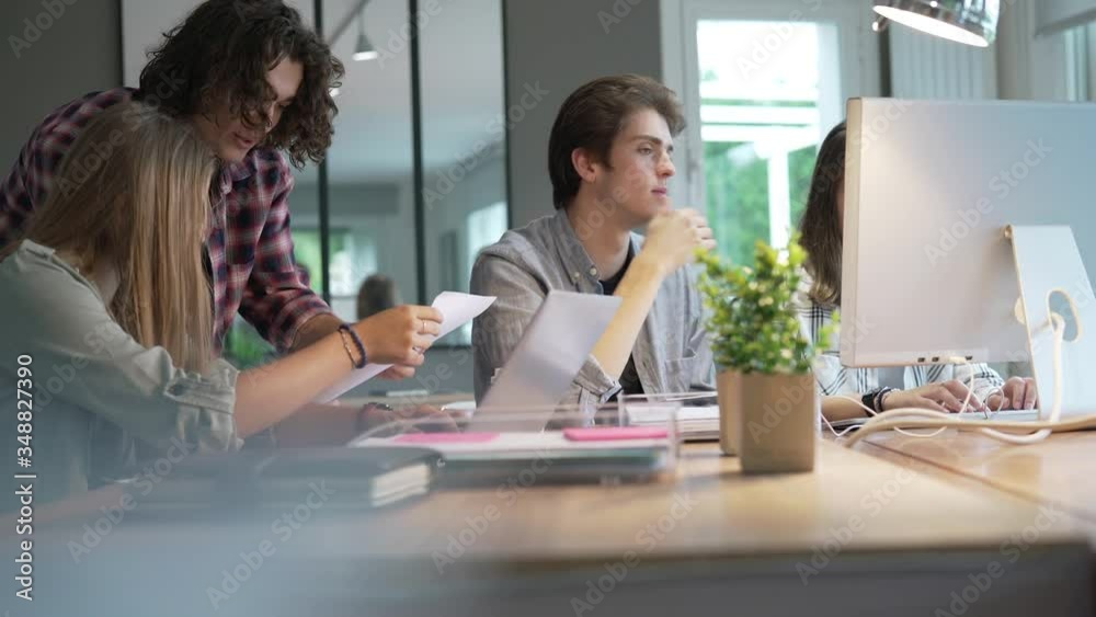 Group of students working together on project Group of students working together on project