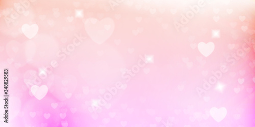 Glowing pink and orange bokeh background. Spring concept. Blurred bokeh circles and hearth shapes.