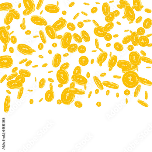 Indian rupee coins falling. Scattered disorderly I