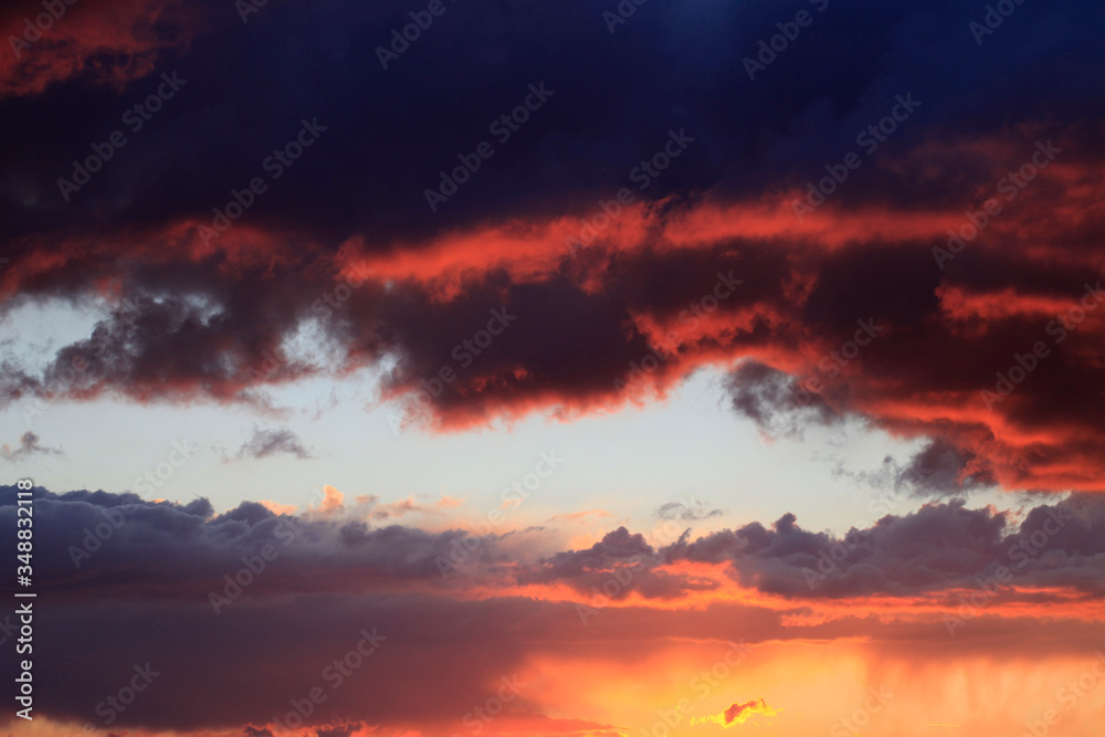 Beautiful heavenly landscape. Clouds in the evening sky at sunset