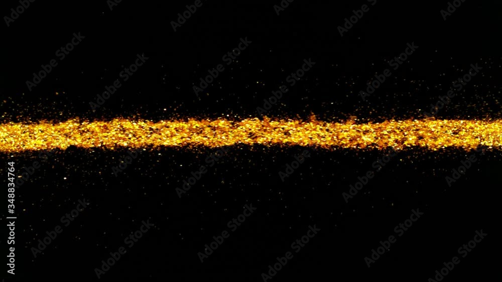 Super Slow Motion Shot of Golden Glitter Line Isolated On Black Background at 1000 fps. Super Slow Motion Shot of Golden Glitter Line Isolated On Black Background at 1000 fps.