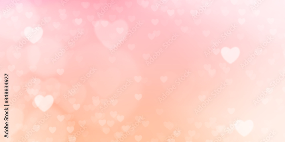 Glowing soft orange and pink bokeh background. Spring concept. Blurred bokeh hearth shapes. Glowing soft orange and pink bokeh background. Spring concept. Blurred bokeh hearth shapes.
