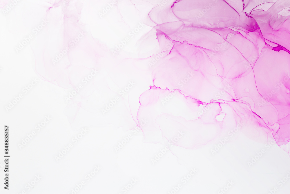 Abstract colorful alcohol ink color pink rose tone on white background. Abstract artwork. Trendy wallpaper.