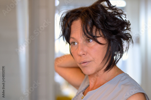 Hispanic woman with tousled dark hair Free Download Hispanic woman with tousled dark hair - GFXLoad