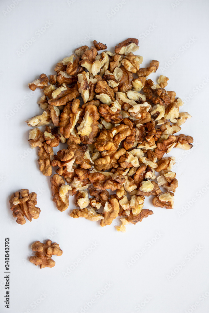 walnut on a white background, walnut halves, close-up walnut on a white background, walnut halves, close-up