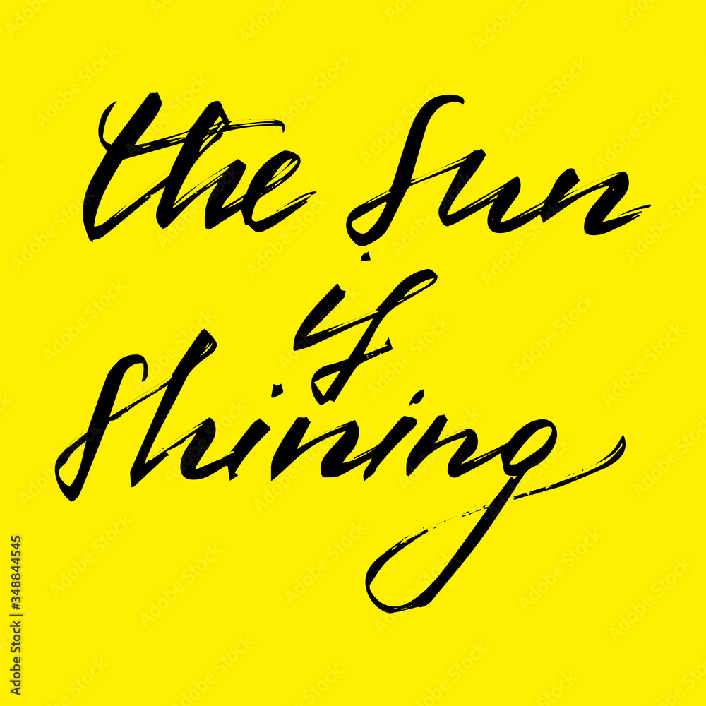 The sun is shining, handwritten text isolated on yellow background t shirt print design The sun is shining, handwritten text isolated on yellow background t shirt print design