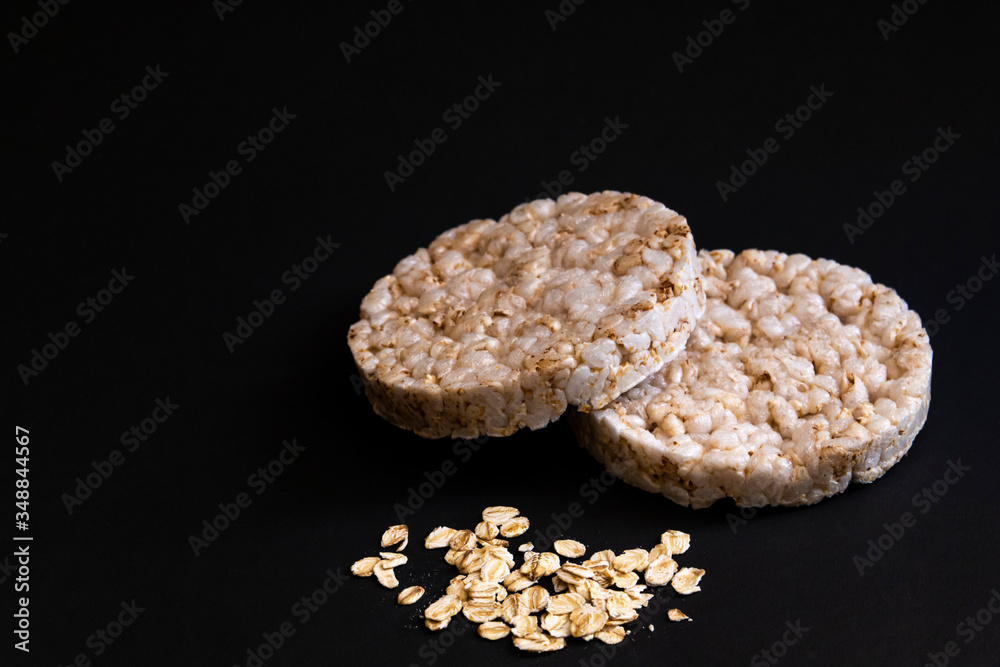 tasty rice waffles on a black isolated background