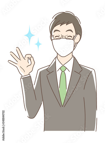 マスクを付けた笑顔の男性